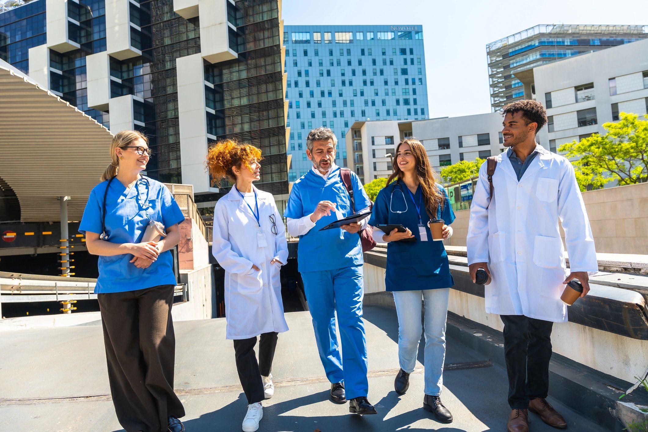 Healthcare team collaborating outdoors
